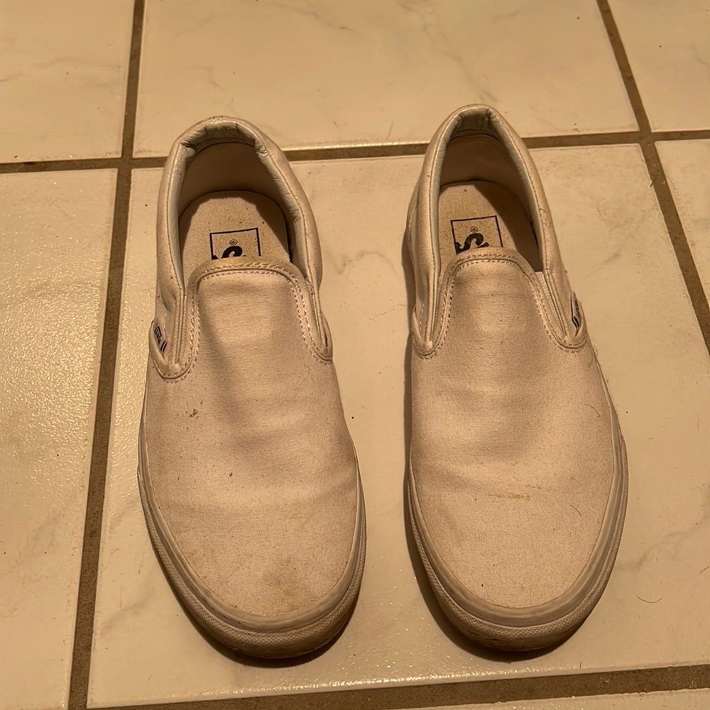 white slip on vans